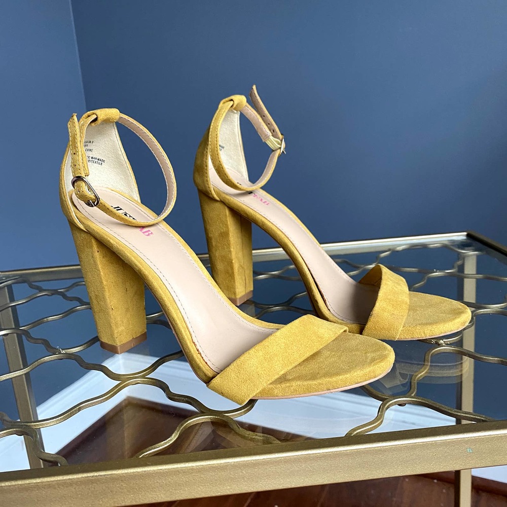 Yellow open toe pumps